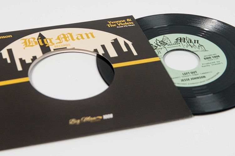 7" vinyl with ‘dinked’ centre hole.