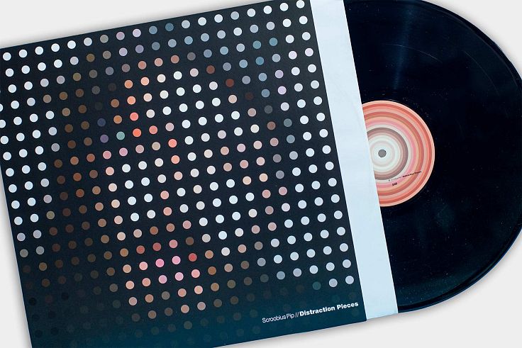 12" vinyl in 3mm spined sleeve with paper inner