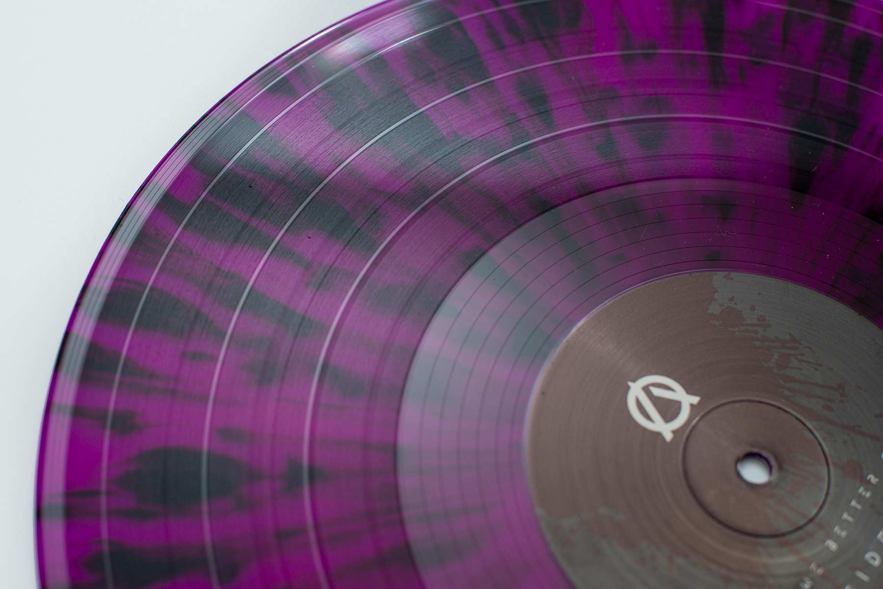purple and black splatter vinyl record