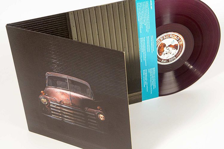 12" gatefold vinyl with printed inner.