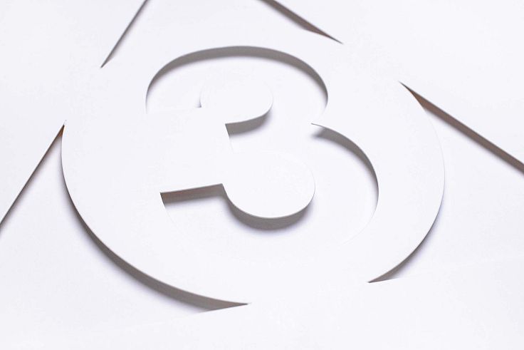 Here the design is entirely represented by a die-cut in the outer sleeve.