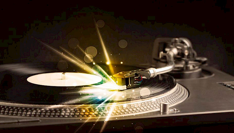 Vinyl Record playing with a spark of light